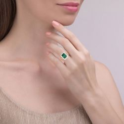 Jeulia Unique Halo Emerald Cut Sterling Silver Ring